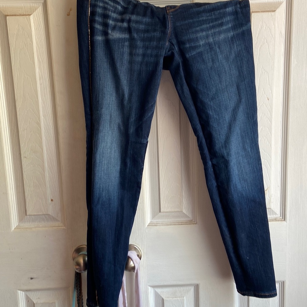 Chicos skinny ankle jeans with golden trim and rose gold accents